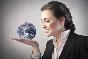 confident woman with world at her fingertips